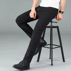 Men's pure black jeans Korean version trendy straight fit pants men's comfortable and elastic classic business jeans Dropshipman