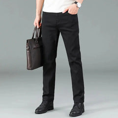 Men's pure black jeans Korean version trendy straight fit pants men's comfortable and elastic classic business jeans Dropshipman