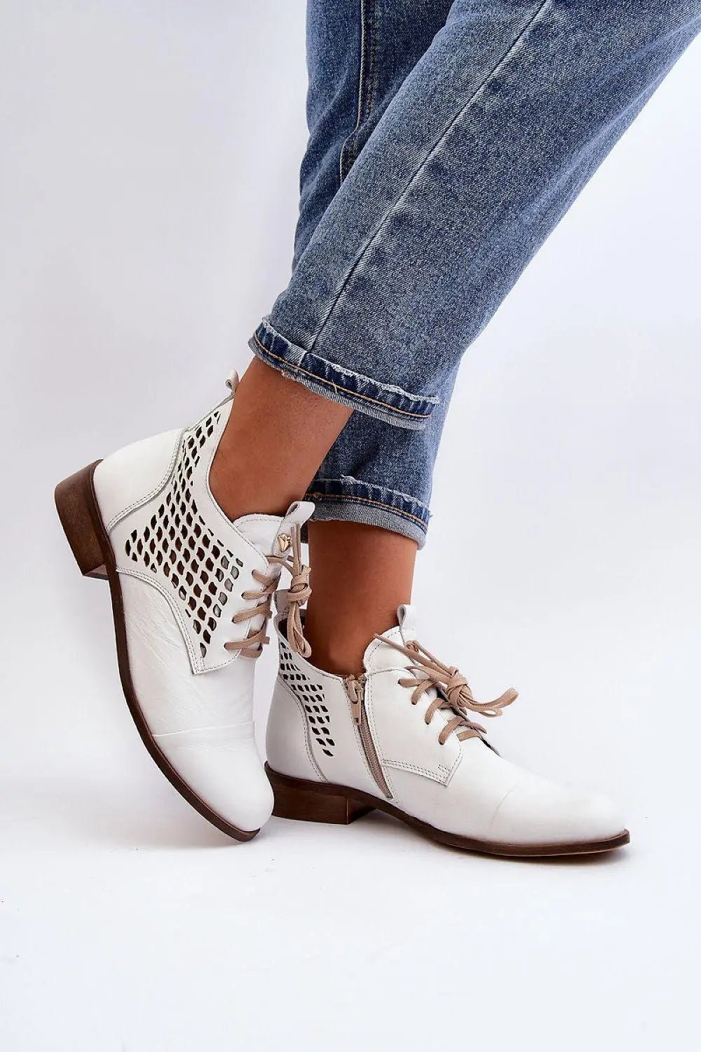 Step in style Women's natural suede boots with a low, openwork. - Honesty Sales